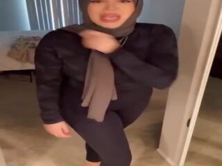 Streetwalker in a hijab with a big ass